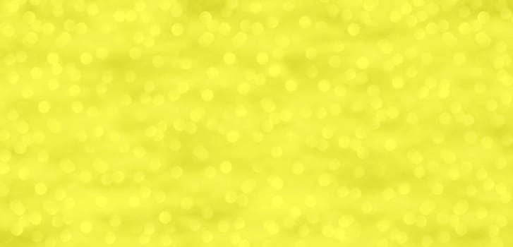 Yellow and gold background with dots of light