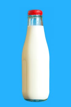Bottle of fresh milk isolated on blue background