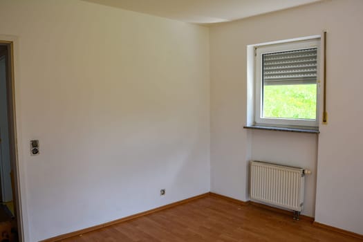 Room during renovation with a window