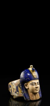 Ancient Egyptian king golden mask on ring banner. Royal antiquated luxury old civilization jewelry. Generate ai