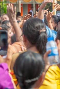 Burmese people dress in national costumes. Come out to participate and dance in the Kathin festival during the end of Buddhist Lent for Burmese brothers and sisters in Thailand.