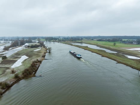 Cargo boat on the IJssel river in the Netherlands