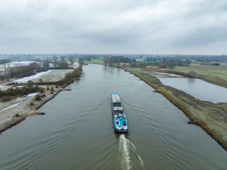 Cargo boat on the IJssel river in the Netherlands