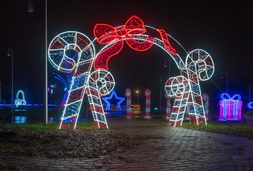 KRAKOW, POLAND - DECEMBER 25, 2023: Smurfs exhibition in the Garden of Light during Christmas time