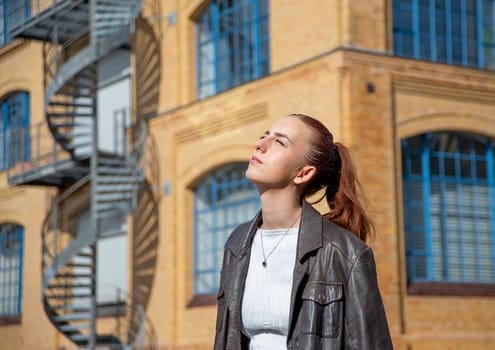 young woman enjoying evening sun