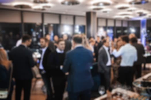 Blurred image of businesspeople at banquet event business meeting event. Business and entrepreneurship events concept.