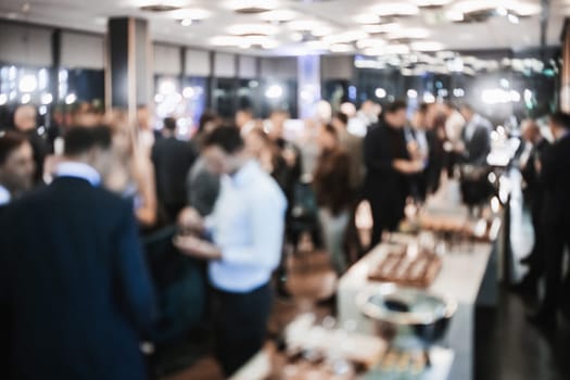 Blurred image of businesspeople at banquet business meeting event. Business and entrepreneurship events concept.