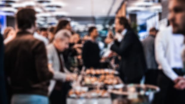 Blurred image of businesspeople at banquet business meeting event. Business and entrepreneurship events concept.