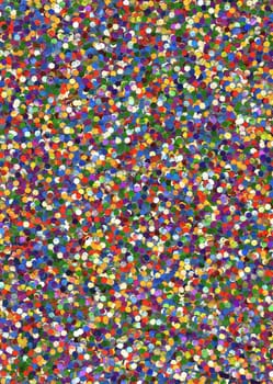 Background image of multicolored tinsel from a firecracker close-up view from above