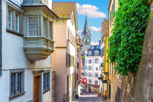 Empty european street by the Fraumunster abbey or Women's Minster in the downtown of Zurich, Switzerland.