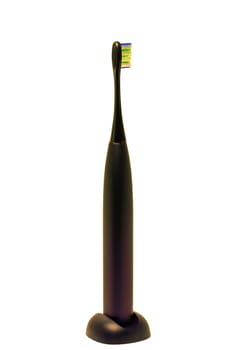 Electric toothbrush isolated on a white background. Electronic ultrasonic toothbrush with usb charger. Dental care concept. Oral Hygiene.