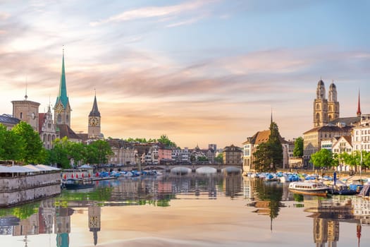 Aerial view on the downtown of Zurich at sunset and its reflection, Switzerland.