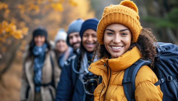 Group of adults hiking in autumn forest