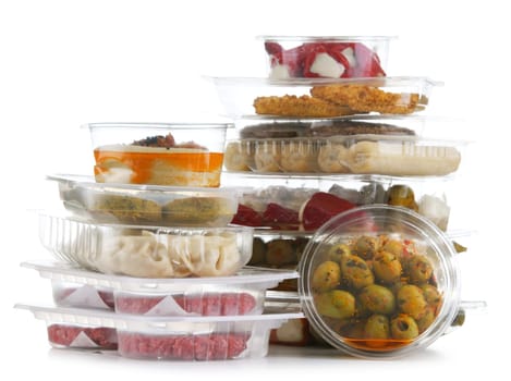 Variety of prepackaged food products in plastic boxes isolated on white background