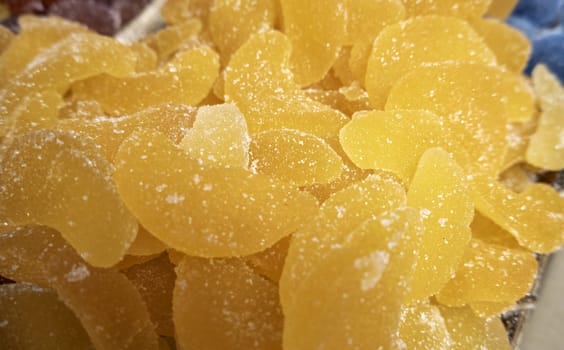 Orange jelly beans with sugar