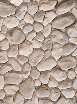 Decorative stone in the form of gray cobblestones of various shapes.Texture or background.