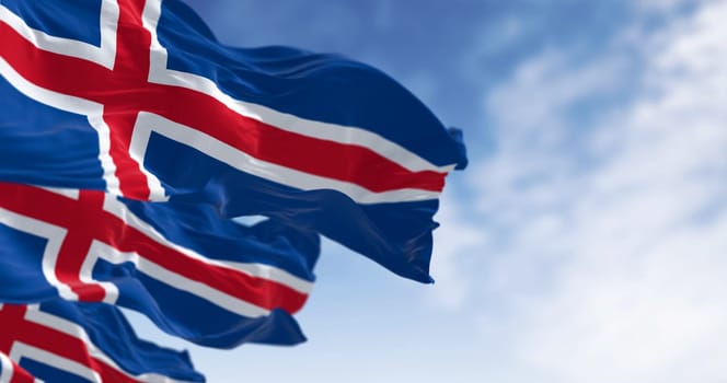 Close-up of Iceland national flags waving. Blue with a white cross and a red cross inside the white cross. 3d illustration render. Fluttering fabric