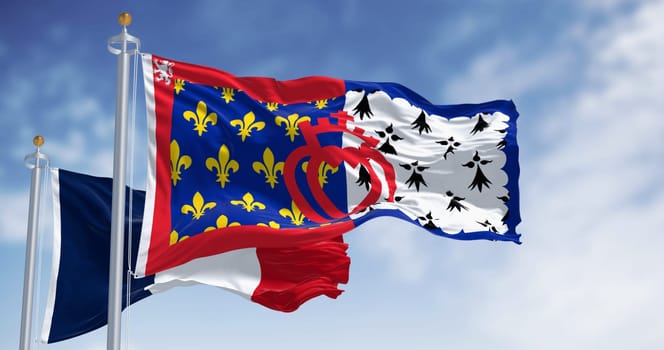 The flag of Pays de la Loire French region waving in the wind on a clear day. Pays de la Loire is one of the 18 regions of France, in the west of the mainland. French administrative region
