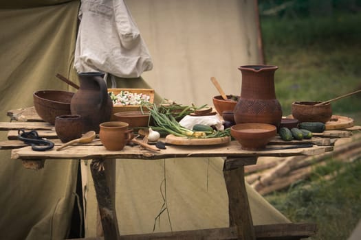 Still life from ancient clay pots. Old times life reconstruction.