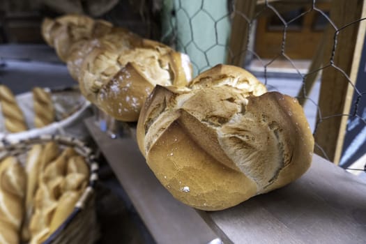 Detail of craftsmanship and old traditional bakery, quality and healthy bread