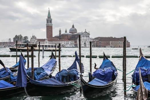Venice, Italy - May 29, 2016: Boats near the coast in Venice. River individual transport