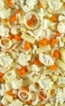 Ingredients from cabbage, potatoes and carrots for a vegetarian salad close-up view from above. Texture or background