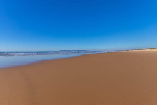 Atlantic Ocean at Costa da Caparica beach, near Lisbon in Portugal.
