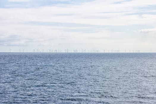 Wind farms on the horizon of the sea. Wind farms on the horizon of the sea.