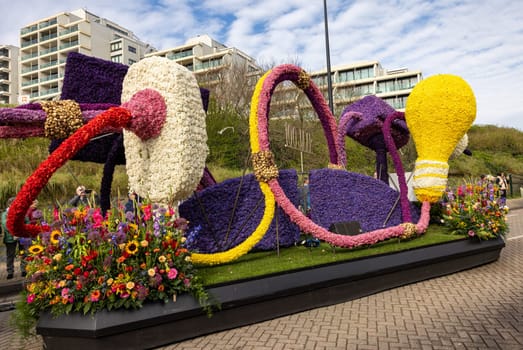 Noordwijk, Netherlands - April 22, 2023: Spectacular flower covered floats in the Bloemencorso Bollenstreek the annual spring flower parade from Noordwijk to Haarlem in the Netherlands.
