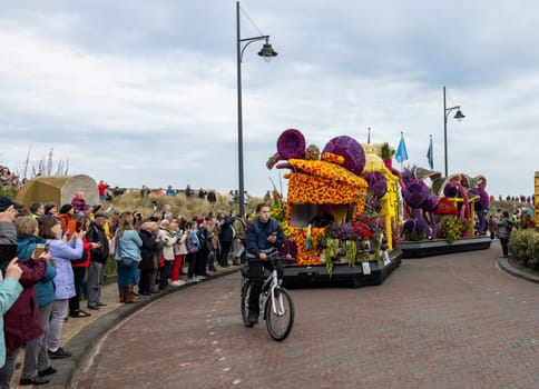 Noordwijk, Netherlands - April 22, 2023: Spectacular flower covered floats in the Bloemencorso Bollenstreek the annual spring flower parade from Noordwijk to Haarlem in the Netherlands.