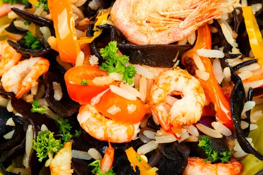 Shrimp fried rice serves on the dish. Healthy Asian meal.