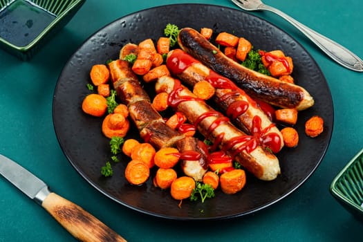 Grilled or roasted turkey meat sausages in tomato ketchup with roasted carrots. Assorted succulent fried sausages.