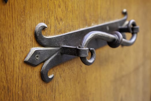 Detail of an old handle to open a door