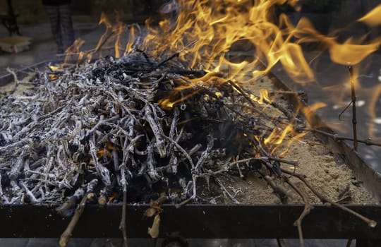 Detail of wood burning with fire and flames, destruction
