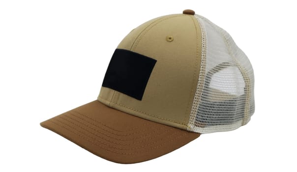 Basic baseball cap with mesh isolated on white background. Summer headdress in white, brown and beige. Mockup for your design, branding. A fashionable accessory with a large visor. Side view