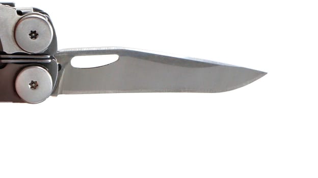 A steel multi-tool with an open knife blade lies on a white background. Pocket open folding knife. Portable multitasking multitool with many tools. EDC concept. A tool for daily practice. All in one