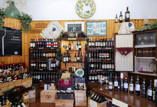 Montalcino, Italy - September 12, 2022: Interior of a wine shop in Montalcino ,Tuscany, Italy. Montalcino is famous for its Brunello di Montalcino wine.