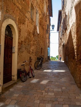 Pienza, Italy - Sept 12, 2022: Pienza, a tiny village in the Tuscany, known as the ideal city of the Renaissance and a capital of pecorino cheese. UNESCO World Heritage Site.
