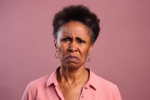 mature African American woman with disgusted emotion, head and shoulders portrait on pink background. Neural network generated image. Not based on any actual person or scene.