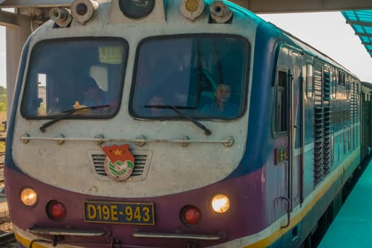 Ninh Binh, Vietnam - December 1st, 2016: A train of Vietnamese Railways is ready to approach to Hanoi.