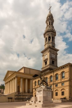 Monteforte d'Alpone, Italy - June 17th, 2018: The city center  with the town-hall and the magmificent church Santa Maria Maggiore make an impressive view during a late summer afternoon.