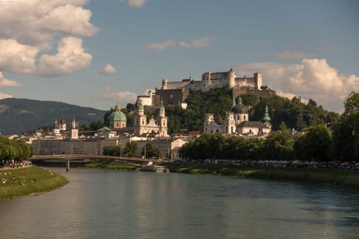 Salzburg, Austria - May 21st, 2018: View to the old town and the castle Hohensalzburg at an early summer day in the afternoon.