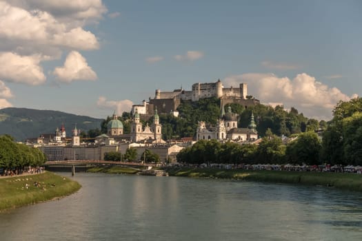 Salzburg, Austria - May 21st, 2018: View to the old town and the castle Hohensalzburg at an early summer day in the afternoon.