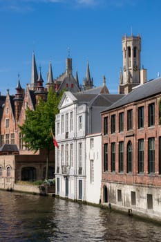 Impressions of brickwall houses along a small river in the Venice of the North, Bruges in Belgium