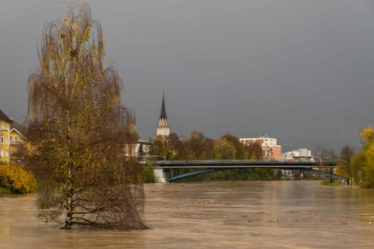 Villach, Austria - October 30th, 2018: Floodwater at rather high levels hits the town after widespread heavy rainfalls, pushing the city close to a catastrophe
