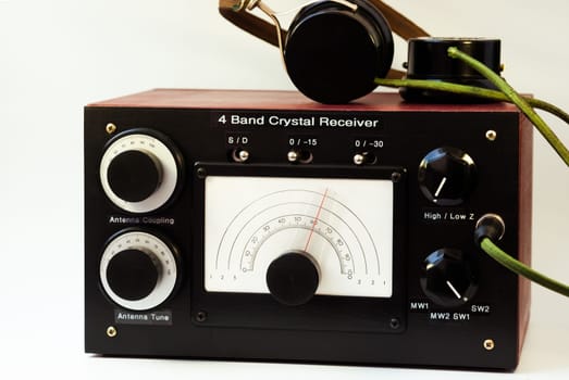 A homebrew crystal radio receiver with vintage headphones