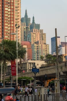 Bangkok, Thailand - January 14th, 2019: Twilight view to Bangkok skyscrapers shining in the late sun around Ratchaprarop Road at Ratchathewi District.