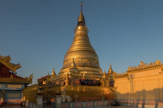 Soon U Ponya Shin Paya, built as early as 1312 at Sagaing Hill, shining in the golden light of sunset