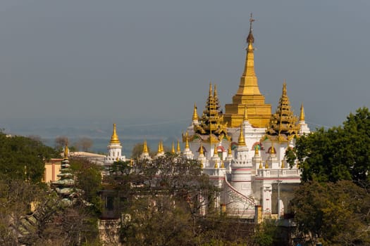 Sagaing, Myanmar - January 16th, 2019: View to the beautiful U Min Kyaukse Pagoda, one of the many pagodas at Sagaing Hill in Myanmar