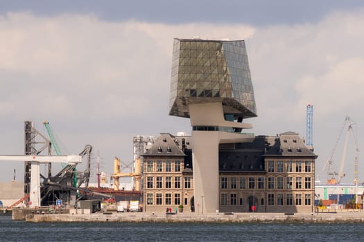 Antwerp, Belgium - June 8th, 2019: View to the unique Port House, home of the port authority's head office, at the port of Antwerp.